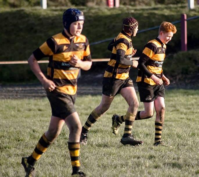 Seth playing rugby for Llangwm